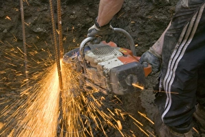 Construction Worker Equipment Prints: a builder using an angle grinder