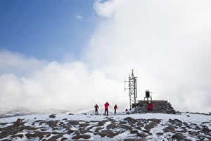 A group of mountaineers ascending Cairngorm in the Cairngorm National Park in Scotland UK A group of mountaineers ascending Cairngorm in the Cairngorm National Park in Scotland UK