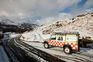 A landrover belonging to the Langdale Ambleside Mountain Rescue Team in winter snow in A landrover belonging to the Langdale Ambleside Mountain Rescue Team in winter snow in