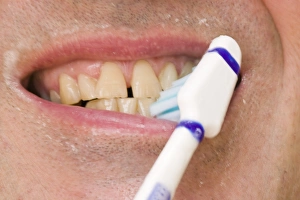 Prints of Ashley Cooper / SpecialistStock Images Dated 2009 January: A man brushing his teeth Print