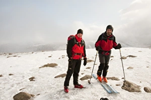 Ski Mountaineers on the summit of Cairngorm in Scotland UK Ski Mountaineers on the summit of Cairngorm in Scotland UK