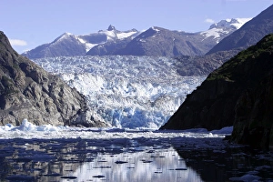 South Sawyer Glacier with icebergs/bergy bits calved off in Tracy Arm, Southeasat Alaska, USA. Pacific Ocean South Sawyer Glacier with icebergs/bergy bits calved off in Tracy Arm, Southeasat Alaska, USA. Pacific Ocean