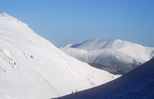 Walkers on the Keswick fells in the Lake District, UK Walkers on the Keswick fells in the Lake District, UK