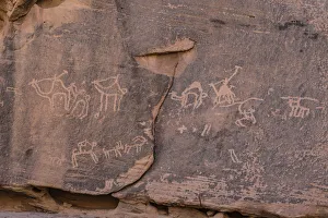 Ancient Thamudic rock art or petroglyphs in Wadi Rum in Jordan Ancient Thamudic rock art or petroglyphs in Wadi Rum in Jordan