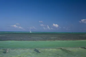 Belize 1813 Print: Sailing Boat at Caye Caulker Island Beach