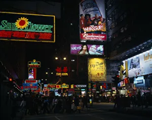 CHINA, Hong Kong, Kowloon Illuminated advertising hoarding CHINA, Hong Kong, Kowloon Illuminated advertising hoarding