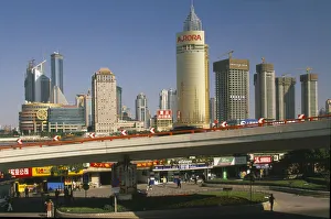 China Shanghai View of Pudong from the Bund with elevated roadway China Shanghai View of Pudong from the Bund with elevated roadway