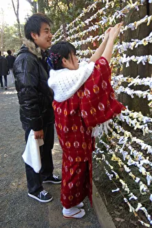 Jingumae - at Meijijingu shrine couple boy and girl early twenty years old girl in traditional kimono Jingumae - at Meijijingu shrine couple boy and girl early twenty years old girl in traditional kimono