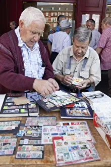 Spain, Madrid, Stamp collectors in the Plaza Mayor Spain, Madrid, Stamp collectors in the Plaza Mayor