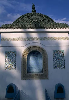 TUNISIA, Nabeul Part view of exterior of tomb with domed, tiled roof TUNISIA, Nabeul Part view of exterior of tomb with domed, tiled roof