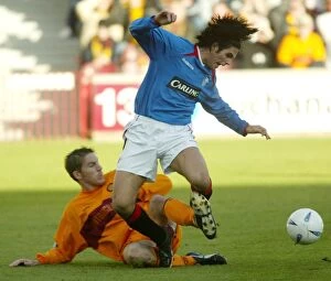 Images Dated 19th October 2003: Rangers Historic 14-1 Victory Over Motherwell: A Thrilling October 14, 2003 Football Match