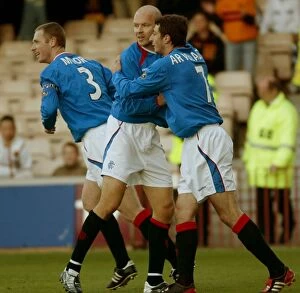 Images Dated 19th October 2003: Thrilling 14-1 Rangers Victory Over Motherwell: A Historic Football Match from October 14, 2003