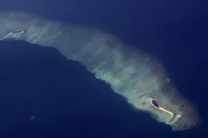 An aerial view of an atoll in the Maldives An aerial view of an atoll in the Maldives