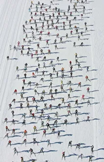 Aerial view of cross country skiers racing over the frozen Lake Sils during the Engadin Aerial view of cross country skiers racing over the frozen Lake Sils during the Engadin
