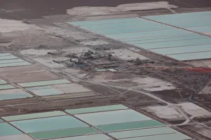 An aerial view shows the brine pools of SQM lithium mine on the Atacama salt flat in the An aerial view shows the brine pools of SQM lithium mine on the Atacama salt flat in the