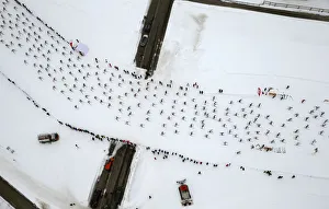 An aerial view shows cross-country skiers competing during 48th Engadin Ski Marathon An aerial view shows cross-country skiers competing during 48th Engadin Ski Marathon
