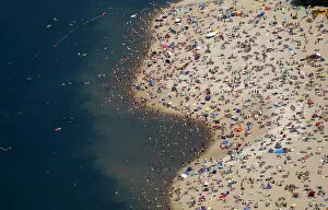 Belgium Collection: An aerial view shows people at a beach on the shores of the Silbersee lake on a hot