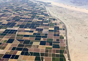 Agricultural farm land is shown next to the desert in the Imperial valley near El Centro Agricultural farm land is shown next to the desert in the Imperial valley near El Centro