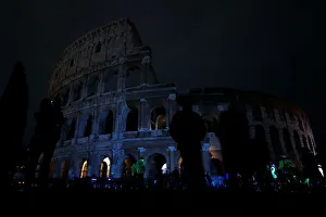 The ancient Colosseum is seen after the lights were switched off for Earth Hour in Rome The ancient Colosseum is seen after the lights were switched off for Earth Hour in Rome