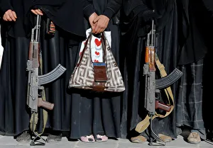 Armed women attend a rally to show support to the Houthi movement in Sanaa, Yemen Armed women attend a rally to show support to the Houthi movement in Sanaa, Yemen