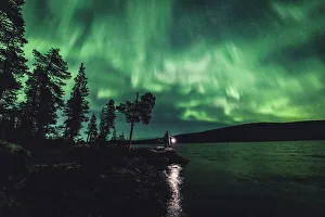 The Aurora Borealis (Northern Lights) is seen in the sky in Ivalo of Lapland The Aurora Borealis (Northern Lights) is seen in the sky in Ivalo of Lapland