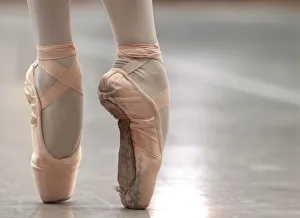 A ballet dancer performs on blocked shoes during a classical class at the Prix de A ballet dancer performs on blocked shoes during a classical class at the Prix de