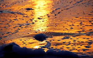 A beach along the Atlantic Ocean coast is pictured at sunset in Montalivet-les-Bains A beach along the Atlantic Ocean coast is pictured at sunset in Montalivet-les-Bains