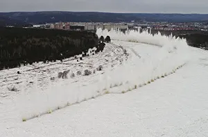 A blast rips through the ice covering the Kan river to reduce the risk of floods A blast rips through the ice covering the Kan river to reduce the risk of floods