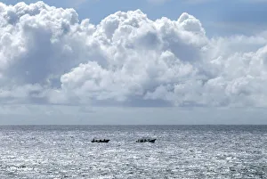 TWO BOATS NAVIGATE IN THE SEA NEAR EASTER ISLAND TWO BOATS NAVIGATE IN THE SEA NEAR EASTER ISLAND