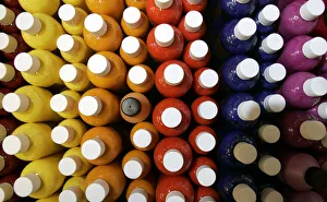 Bottles of coloured inks used for tattooing are displayed for sale at the International Bottles of coloured inks used for tattooing are displayed for sale at the International