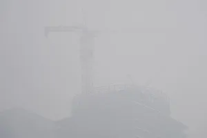 A building under construction is seen amid heavy smog in Beijings central business area A building under construction is seen amid heavy smog in Beijings central business area