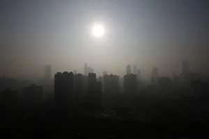 Buildings are seen through thick haze in downtown Shanghai Buildings are seen through thick haze in downtown Shanghai