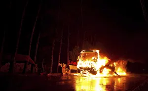 Bus is seen on fire in front of Pinheirinho slum where residents try to fight eviction Bus is seen on fire in front of Pinheirinho slum where residents try to fight eviction