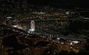 Christmas decorations and a Ferris wheel light the port of Monaco during holiday season Christmas decorations and a Ferris wheel light the port of Monaco during holiday season