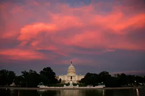 Images Dated 20th September 2006: Clouds glow over the Capitol Building at sunset in Washington