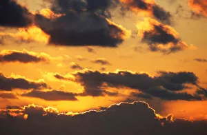 Clouds are pictured at sunset over a beachfront along the Atlantic Ocean coast in Clouds are pictured at sunset over a beachfront along the Atlantic Ocean coast in
