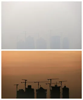 A combination picture shows cranes standing above an apartment complex in Singapore A combination picture shows cranes standing above an apartment complex in Singapore