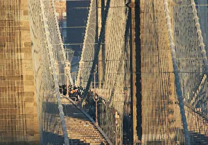 Commuters pack the Brooklyn Bridge in New York Commuters pack the Brooklyn Bridge in New York