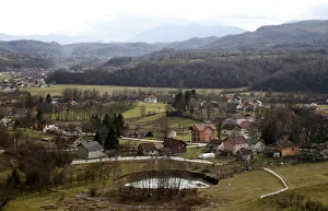 A crater is seen in Sanica, near Sanski Most A crater is seen in Sanica, near Sanski Most