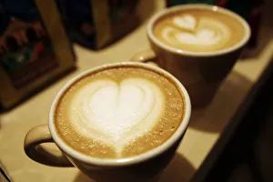 Cups of cappuccino sit on a table during the World Coffee Conference in Guatemala City Cups of cappuccino sit on a table during the World Coffee Conference in Guatemala City