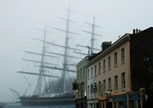 The Cutty Sark is pictured behind buildings at Greenwich in London The Cutty Sark is pictured behind buildings at Greenwich in London