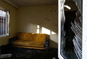 A damaged house is seen after a suspected suicide bomber targeted a wedding celebration A damaged house is seen after a suspected suicide bomber targeted a wedding celebration