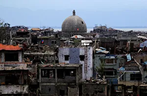 Damaged houses and buildings are seen after government troops cleared the area Damaged houses and buildings are seen after government troops cleared the area
