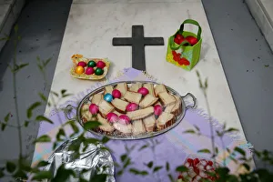 Dyed eggs and food are placed on a grave, on Saint Thomas Sunday Dyed eggs and food are placed on a grave, on Saint Thomas Sunday
