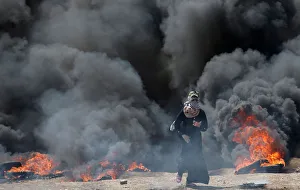 Female Palestinian demonstrator gestures during a protest against U.S Female Palestinian demonstrator gestures during a protest against U.S