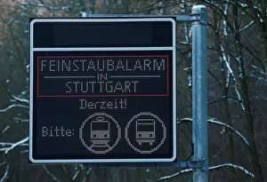 A fine dust warning sign that reads Fine dust warning in Stuttgart is pictured in A fine dust warning sign that reads Fine dust warning in Stuttgart is pictured in