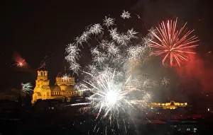 Fireworks explode over the Alexander Nevski cathedral during the New Year celebrations in Fireworks explode over the Alexander Nevski cathedral during the New Year celebrations in