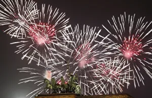 Fireworks explode next to the Quadriga sculpture atop the Brandenburg gate during Fireworks explode next to the Quadriga sculpture atop the Brandenburg gate during