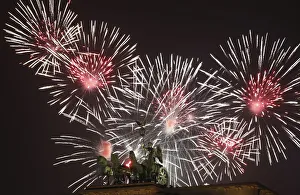 Fireworks explode next to the Quadriga sculpture atop the Brandenburg gate during New Fireworks explode next to the Quadriga sculpture atop the Brandenburg gate during New