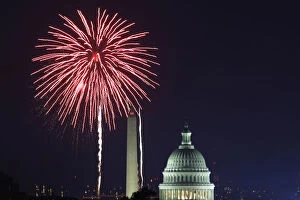 Kang Collection: Fireworks light up the sky over the United States Capitol dome and the Washington